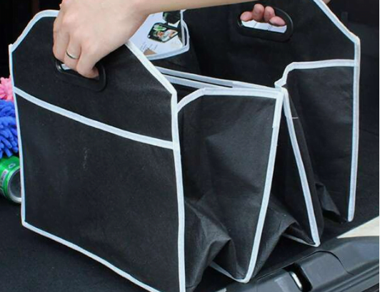 منظم لشنطة السيارة ليه يدين عشان تقدر تشيله من شنطة